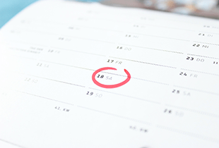 A calendar with a date highlighted.